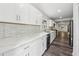 Beautiful kitchen with stainless steel appliances, marble countertops, and subway tile backsplash at 1978 Ethel Ln, Decatur, GA 30032