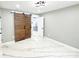 Bedroom features a stylish barn door leading to closet and unique painted floor at 2526 Center Nw St, Atlanta, GA 30318