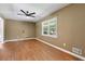 Neutral bedroom featuring hardwood flooring and plenty of natural light at 3105 Sumac Dr, Atlanta, GA 30360