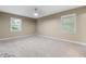 Spacious carpeted bedroom with windows allowing natural light at 3105 Sumac Dr, Atlanta, GA 30360