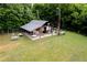 Community area with picnic tables and an outdoor kitchen at 3105 Sumac Dr, Atlanta, GA 30360