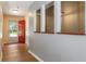 Bright entryway with red front door, wood-look floors, and yellow accents at 3105 Sumac Dr, Atlanta, GA 30360