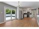 Bright kitchen and dining area with stainless steel appliances and access to an outdoor deck at 3105 Sumac Dr, Atlanta, GA 30360