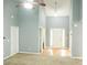 Open living space with vaulted ceilings, natural light, and neutral color scheme; ready for personalization at 85 Lamar Ln, Covington, GA 30016