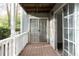 Relaxing covered patio offering outdoor living space and a view of the surrounding greenery at 1941 Brian Way # 1941, Decatur, GA 30033