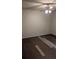 Spacious bedroom with ceiling fan and wood-look floor at 1009 Autumn Crest Ct, Stone Mountain, GA 30083