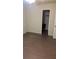 Bedroom featuring wood-look flooring and a closet at 1009 Autumn Crest Ct, Stone Mountain, GA 30083
