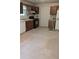 Functional kitchen with essential appliances, wood cabinetry, and ample counter space, awaiting a personal touch at 1009 Autumn Crest Ct, Stone Mountain, GA 30083