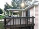 Exterior view of a wooden back deck and part of the house at 1041 Waverly Drive Dr, Lawrenceville, GA 30046