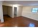 Finished basement with wood floors and natural light from a window at 1041 Waverly Drive Dr, Lawrenceville, GA 30046
