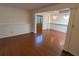 Spacious living room featuring hardwood floors and a decorative door at 1041 Waverly Drive Dr, Lawrenceville, GA 30046