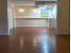 Spacious living room featuring hardwood floors and a wet bar at 1041 Waverly Drive Dr, Lawrenceville, GA 30046