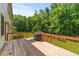 Spacious wooden deck overlooks backyard at 1170 Shellnut Trl, Hoschton, GA 30548