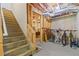 Unfinished basement with wooden stairs ready for a new owner's special touch at 1170 Shellnut Trl, Hoschton, GA 30548