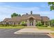 Community clubhouse boasting well-kept landscaping, convenient parking, and inviting entrance at 1170 Shellnut Trl, Hoschton, GA 30548