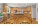Spacious kitchen features granite countertops, stainless steel appliances, and lots of cabinets at 1170 Shellnut Trl, Hoschton, GA 30548
