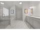 Spacious main bathroom with large shower, soaker tub, and marble floors at 1170 Shellnut Trl, Hoschton, GA 30548
