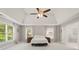 Main bedroom featuring a tray ceiling, soft carpet, and an ensuite bathroom at 1170 Shellnut Trl, Hoschton, GA 30548