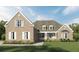 Lovely brick home with manicured lawn and inviting front entrance at 7791 Capps Ridge Ln, Douglasville, GA 30135