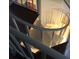 Close-up of a bright, spiral staircase with white steps and railing, connecting multiple levels at 1130 Piedmont Ne Ave # 404, Atlanta, GA 30309