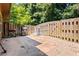 Back yard patio with a wooden fence, barbecue and basketball hoop at 3832 Augustine Pl, Rex, GA 30273