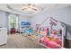 Spacious bedroom with two sized bed frames, carpet and tray ceiling at 3832 Augustine Pl, Rex, GA 30273