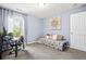 Bedroom featuring natural light from a window, carpet, modern decor, and neutral-colored walls at 3832 Augustine Pl, Rex, GA 30273