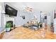Spacious living room with fireplace, ample seating, and stylish decor at 3832 Augustine Pl, Rex, GA 30273