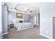 This spacious main bedroom features soft carpet, tray ceiling, and neutral wall color at 3832 Augustine Pl, Rex, GA 30273