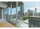 Condo balcony featuring city views with floor to ceiling windows and railing at 400 W Peachtree St # 2108, Atlanta, GA 30308