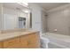 Bathroom featuring vanity, toilet and bathtub with shower head at 400 W Peachtree St # 2108, Atlanta, GA 30308