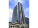 Exterior shot of condo building showing the multiple floors and balconies at 400 W Peachtree St # 2108, Atlanta, GA 30308