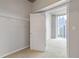 Walk in closet featuring city view from the bedroom window at 400 W Peachtree St # 2108, Atlanta, GA 30308