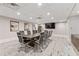 Well-appointed conference room with modern decor, a large table, comfortable seating, and a wall-mounted television at 400 W Peachtree St # 2108, Atlanta, GA 30308