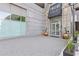 Building entrance featuring glass doors, plants, and address at 400 W Peachtree St # 2108, Atlanta, GA 30308