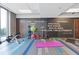 Resident gym with free weights, yoga mats, and a motivating quote wall at 400 W Peachtree St # 2108, Atlanta, GA 30308