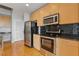 Updated kitchen featuring stainless steel appliances and a black tile backsplash at 400 W Peachtree St # 2108, Atlanta, GA 30308