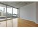 Living room with large windows providing ample light and city views at 400 W Peachtree St # 2108, Atlanta, GA 30308