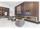 Modern lobby with a cozy fireplace, artistic decor, and comfortable seating area at 400 W Peachtree St # 2108, Atlanta, GA 30308