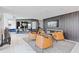 Spacious lounge area with comfortable seating, a fireplace, and a bar for residents at 400 W Peachtree St # 2108, Atlanta, GA 30308