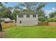 Spacious backyard, completely fenced in, with a lush lawn that is ideal for many kinds of recreation at 1266 Elizabeth Sw Ave, Atlanta, GA 30310