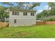 Picture of the home's spacious backyard including the full privacy fence and plentiful lawn at 1266 Elizabeth Sw Ave, Atlanta, GA 30310