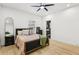 Comfortable bedroom with a ceiling fan, ample natural light, and a relaxing ambiance at 1266 Elizabeth Sw Ave, Atlanta, GA 30310