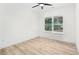 Well-lit bedroom with wide window offering serene views and ceiling fan at 1266 Elizabeth Sw Ave, Atlanta, GA 30310