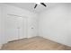Bedroom featuring closet with bi-fold doors and ceiling fan at 1266 Elizabeth Sw Ave, Atlanta, GA 30310