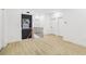 Hallway featuring staircase, railing, and black accent wall at 1266 Elizabeth Sw Ave, Atlanta, GA 30310