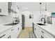 Well-lit kitchen with white cabinetry, modern appliances, and a large center island at 1266 Elizabeth Sw Ave, Atlanta, GA 30310
