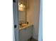 Bathroom with a granite countertop, white cabinet, and tile floors at 455 Crafton Ct, Lawrenceville, GA 30043