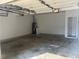 Spacious two car garage with side door and water heater at 455 Crafton Ct, Lawrenceville, GA 30043