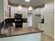 Kitchen featuring granite counters, stainless steel appliances and white cabinets at 455 Crafton Ct, Lawrenceville, GA 30043